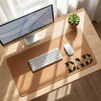 Brown desk mat printed with DAD and family names