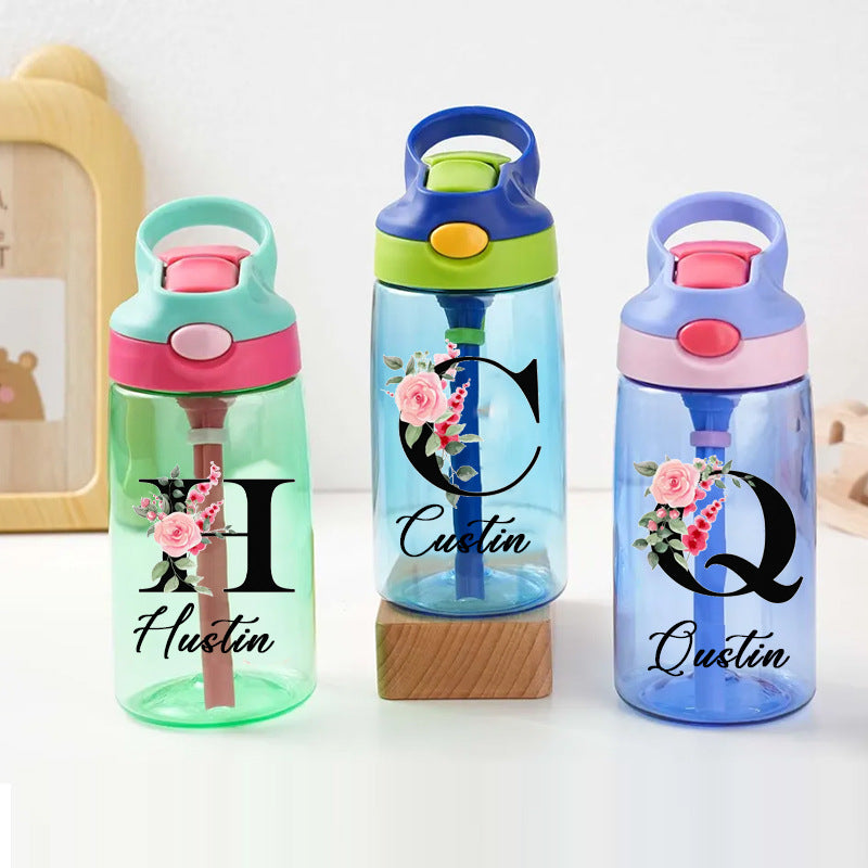 Kids water bottles printed with floral initials and names