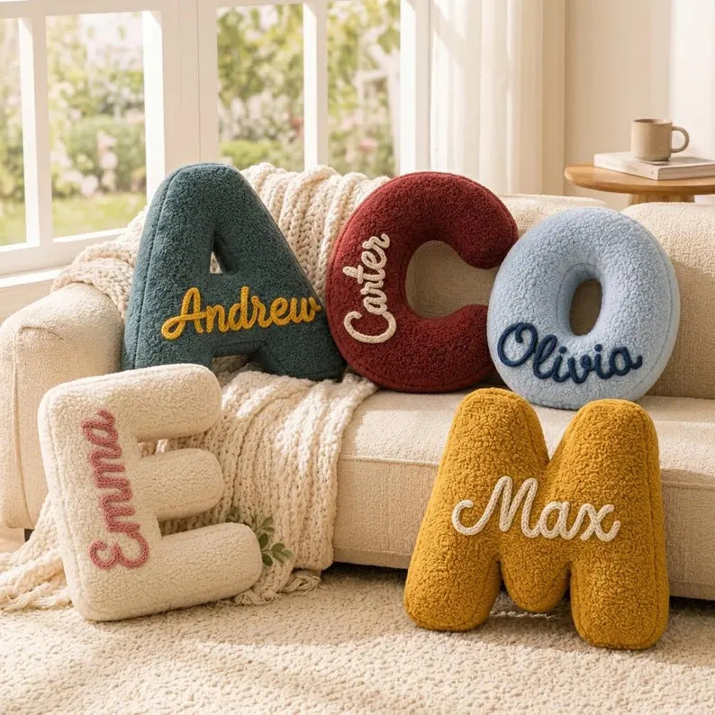Plush letter pillows embroidered with children's names