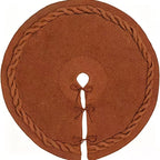 Brown knitted tree skirt with a braided border and bow ties