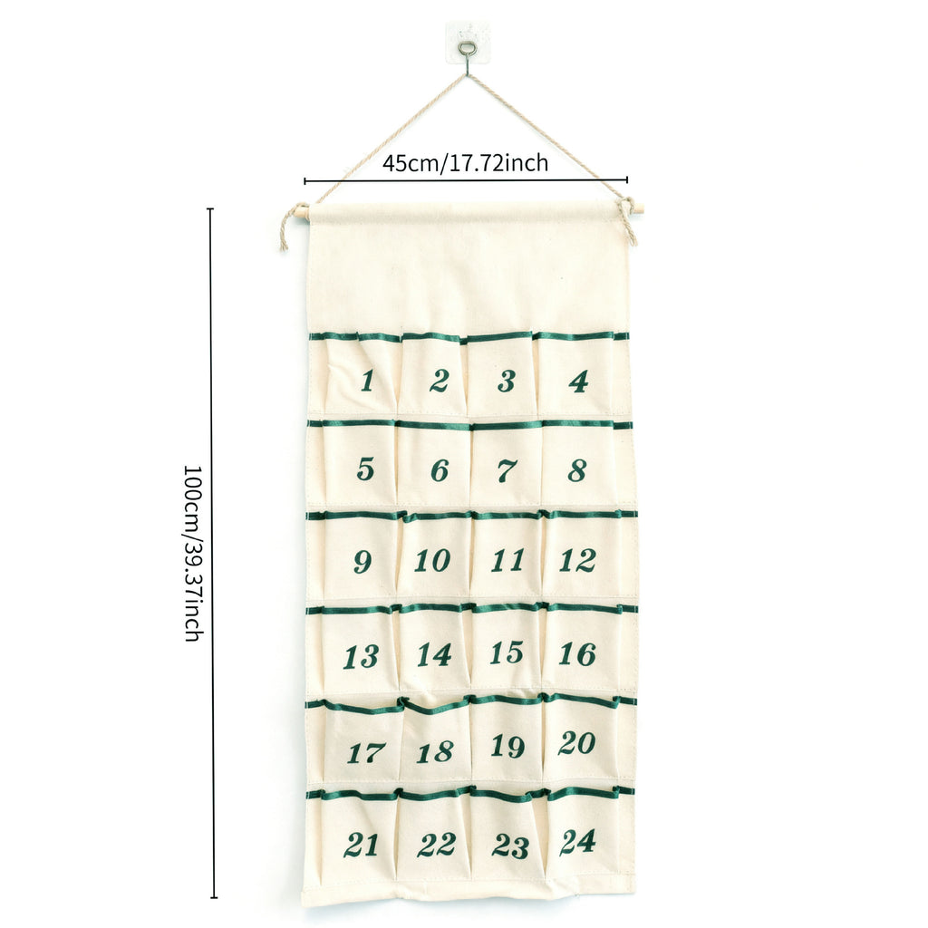 Canvas advent calendar with green pocket trim, about 45 × 100 cm, with 24 numbered pockets