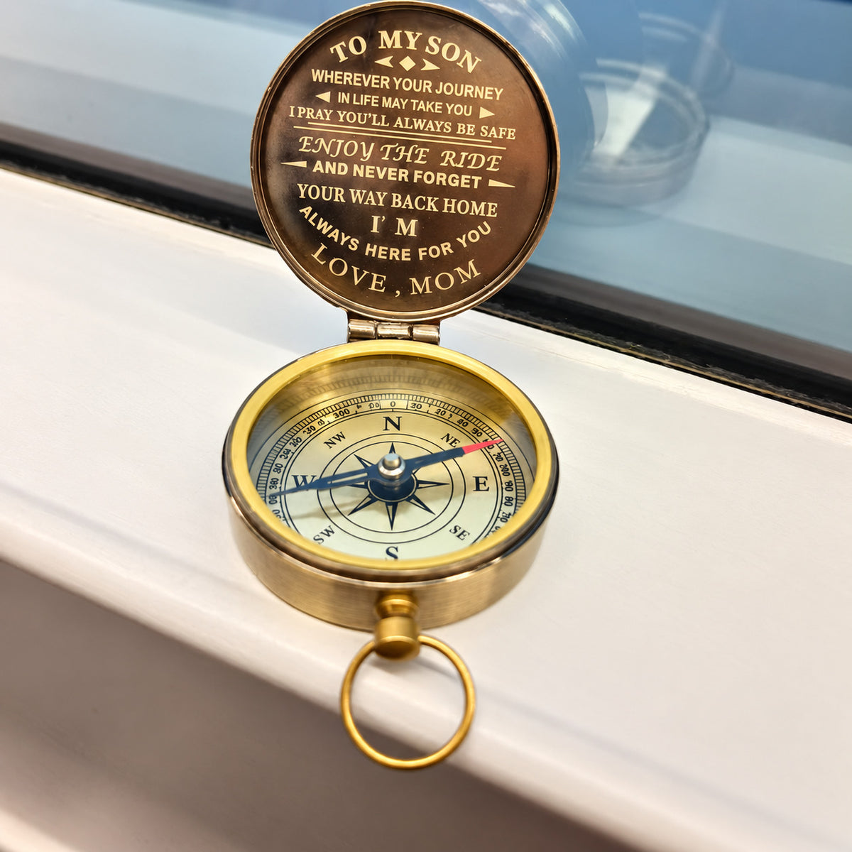 Open brass compass engraved To my son inside the lid