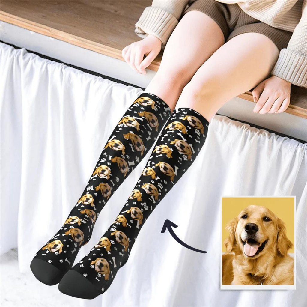 Custom photo socks printed with a golden retriever face on black, next to the original dog photo