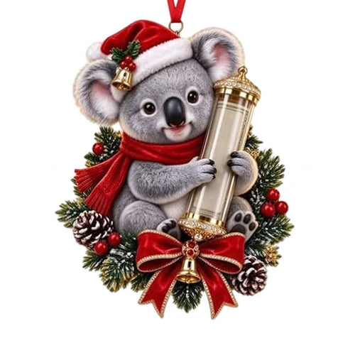 Koala money ornament with a red scarf and a clear tube, on a white background
