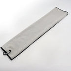 Light gray microfiber golf towel with a dark trim