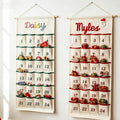 Two personalized advent calendars embroidered with the names Daisy and Myles, pockets filled with small treats