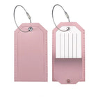Pink leather-look bag tag with a white address insert and a steel loop