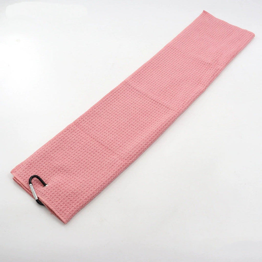 Light pink golf towel with a clip